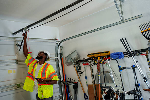 Professional Garage Door Panel Replacement technician working in Greencastle, IN
